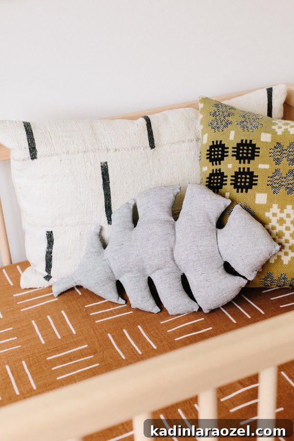 Giant Monstera Leaf Pillow Pattern (Plus Small Version) 6 DIY Pillow Idea: Click through to learn how to make a monstera leaf pillow (and a smaller size too). #diypillow #leafpillow #diyhome #diyhomedecor #nurseryinspiration #kidsroom