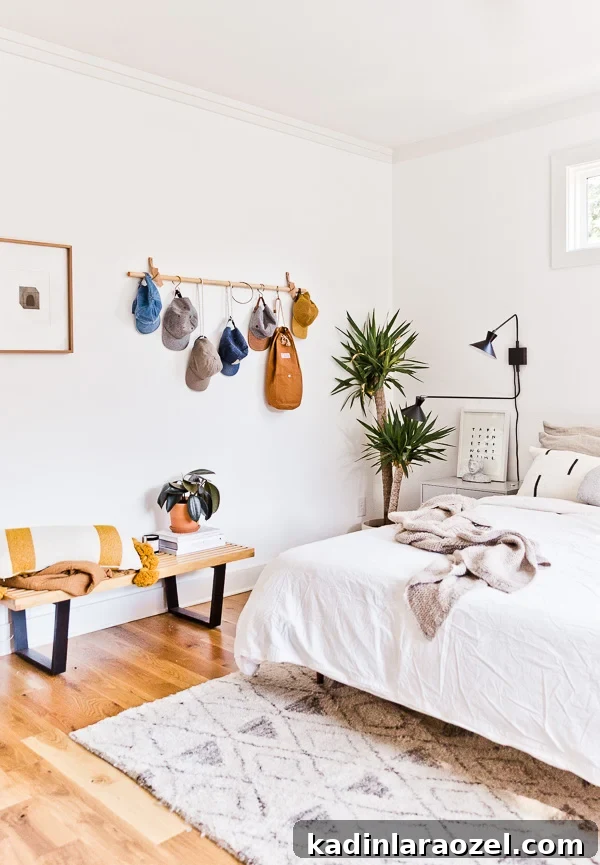Organic modern bedroom with unique wall organizer and neutral decor.