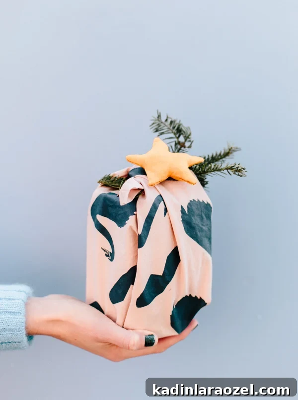 DIY Holiday Fabric Gift Wrap: Stylish Eco-Friendly Ideas 11 Looking for a unique DIY gift wrap idea for the holidays? Check out this tutorial for DIY fabric gift wrap you can customize for everyone on your gift list. #holidays #giftwrap #diyholidays #diy #stenciling #christmas #christmasdiy