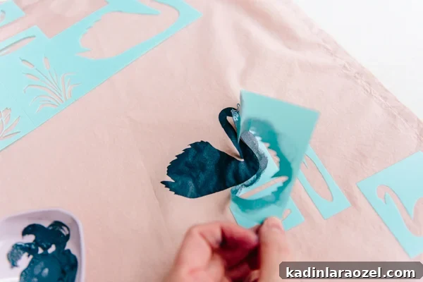 DIY Holiday Fabric Gift Wrap: Stylish Eco-Friendly Ideas 6 How to make DIY fabric gift wrap for the holidays with stencils. #diyholiday #diy #diygiftwrap #giftwrap #stencils
