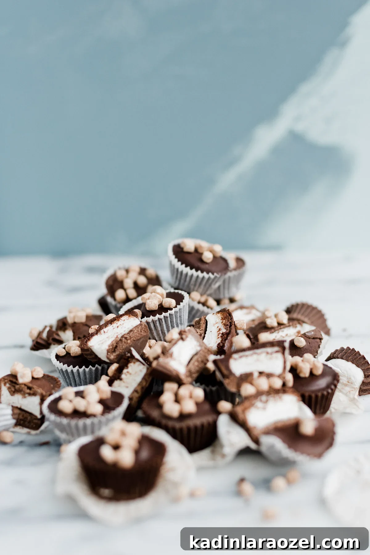 pile of chocolate marshmallow candy cups