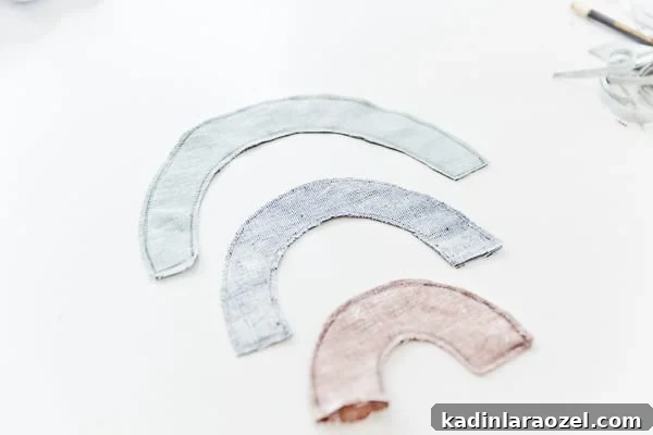 Make Adorable Plush Toys for Kids: Step-by-Step Sewing Guide 4 Cutting rainbow pieces for simple kid's soft toy.