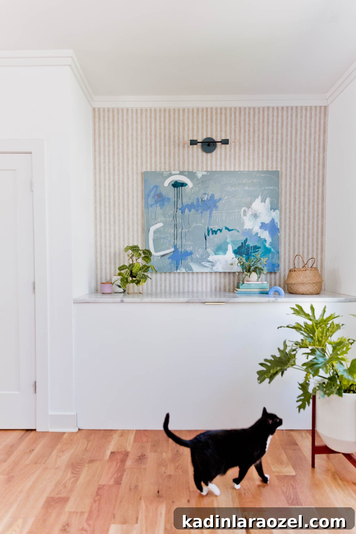 From Farmhouse Drab to Modern Chic: Transforming an Awkward Landing for Under $450 7 Farmhouse Bleak to Modern Chic: How I Made Over My Awkward Landing Area for $450. #interiors #roommakeover #entryway #landingarea #removablewallpaper #rentermakeover