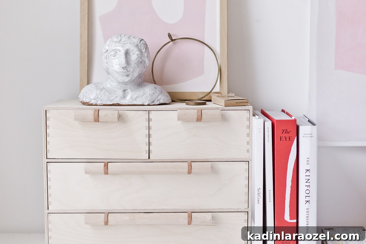 Transform Your Ikea Moppe Mini Chest with a Modern Minimal Hack 11 Close-up of custom wood and leather drawer pulls.