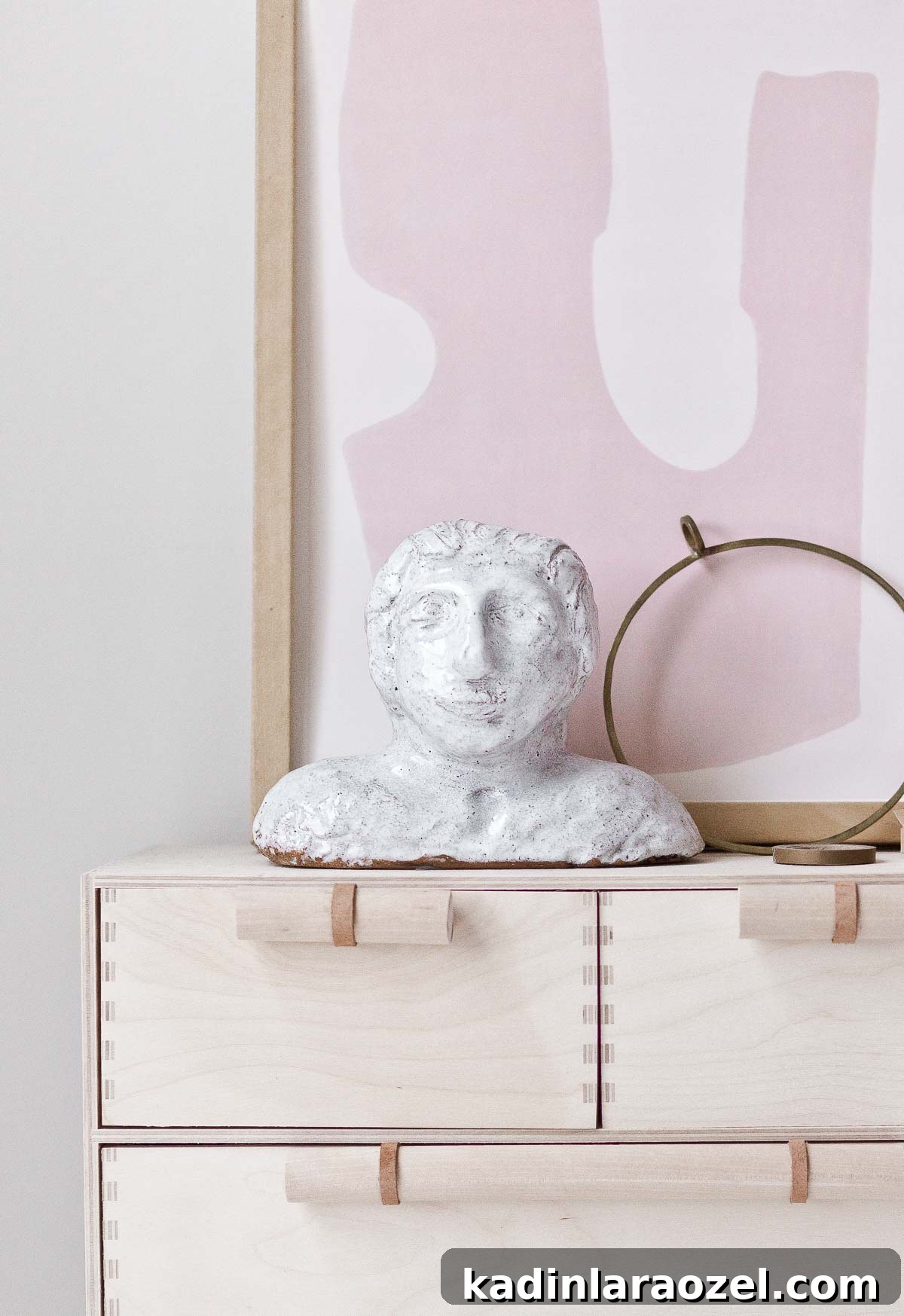 Transform Your Ikea Moppe Mini Chest with a Modern Minimal Hack 3 DIY minimal modern Ikea hack: custom wood and leather drawer pulls for the MOPPE mini chest.