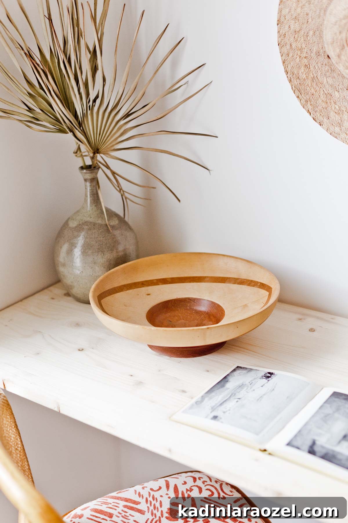 Earthy desert style - handmade pottery and wooden bowls on a simple wooden desk