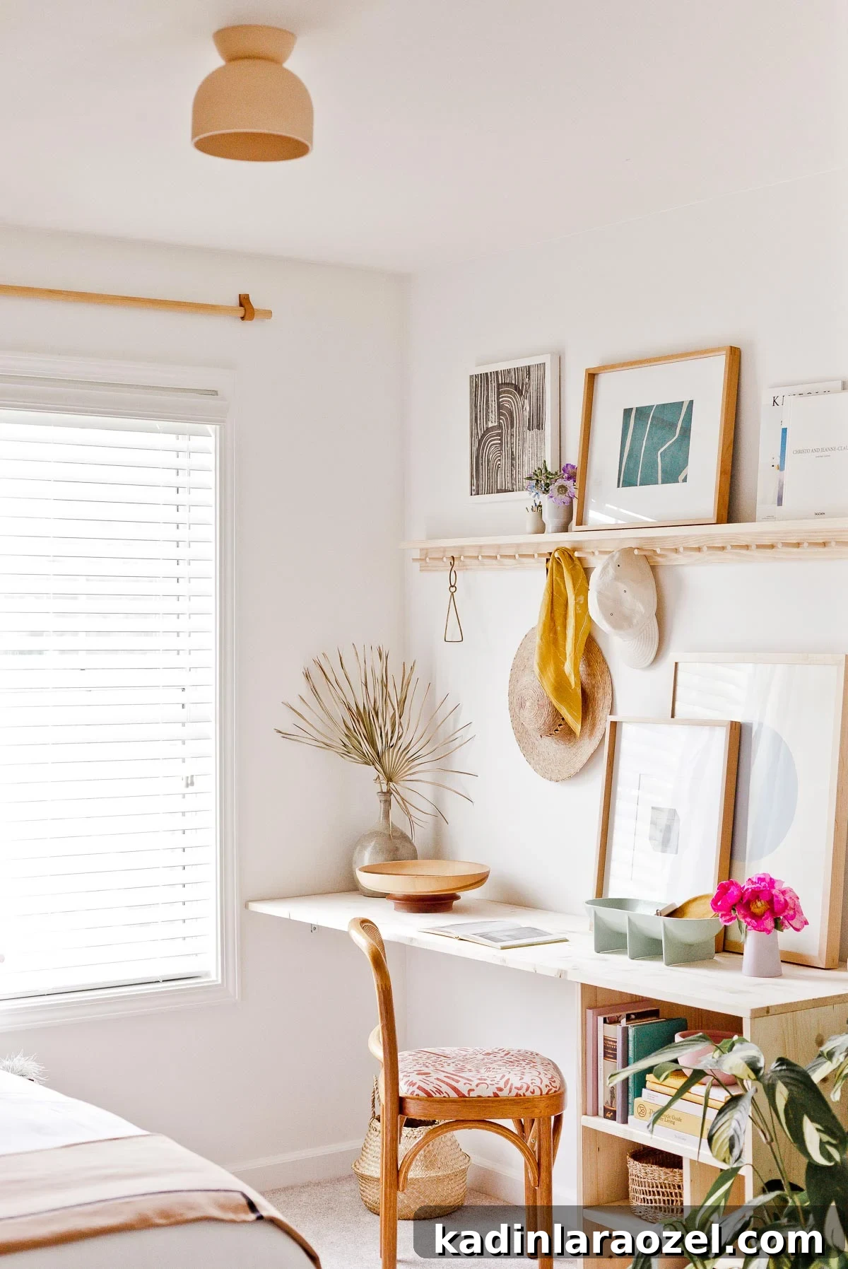 Learn how to build a simple, modern desk like this one for under $100. And explore this home office / guest room makeover designed by Brittni Mehlhoff of Paper and Stitch. #diy #diyfurniture #diydesk #desk #organicmodern #moderninterior #wooddesk #workspace #deskinspiration