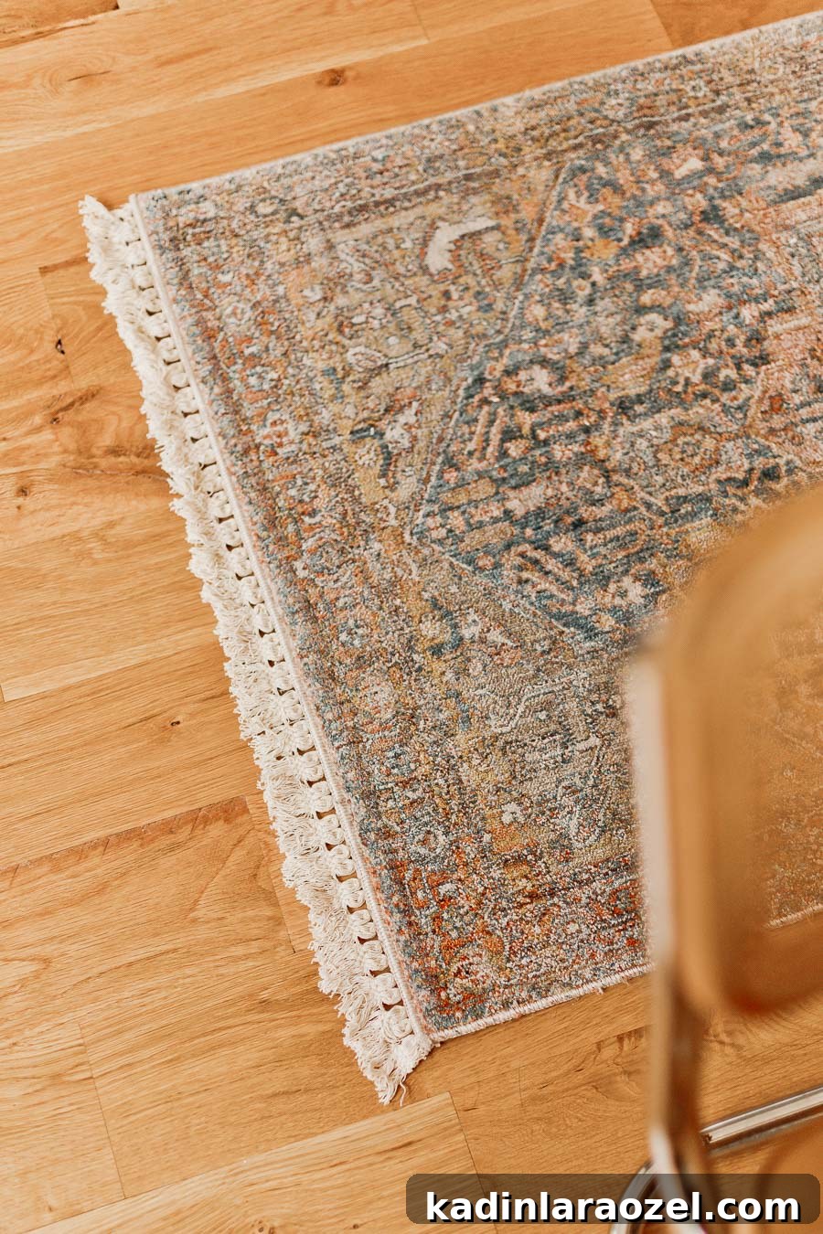 Rug Thug: Upgrade a Cheap Rug for $10 in Under 10 Minutes 10 Persian style rug with cream color fringe on the end, on a warm wood floor in an entryway