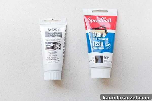 Block Printing Basics: A Step-by-Step Guide to Printing Fabric 10 Two tubes of fabric block printing ink for printing designs onto fabric.