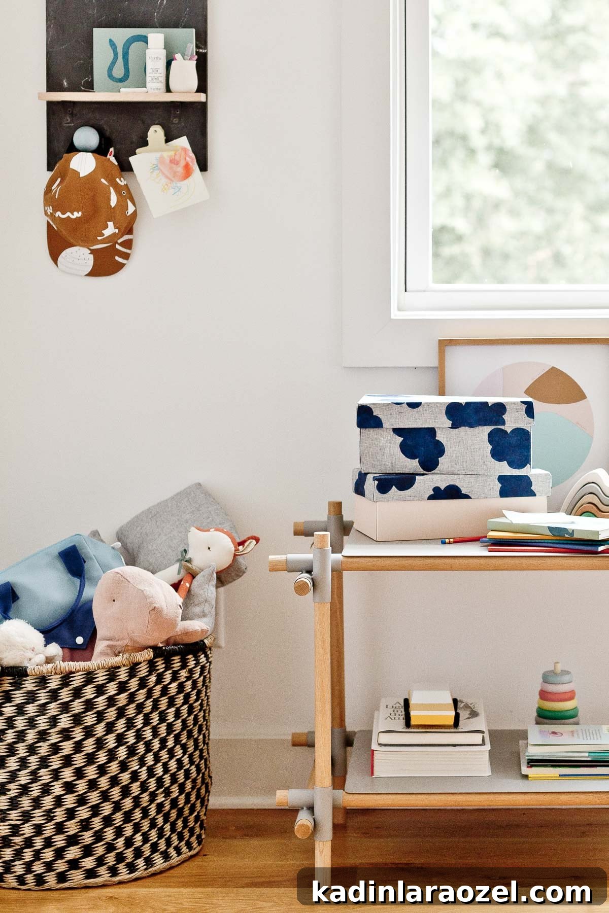3 Stylish Back-to-School DIY Projects That Impress 2 Kid's modern and minimal bedroom with basket full of stuffed animals and shelves with books, toys, and storage