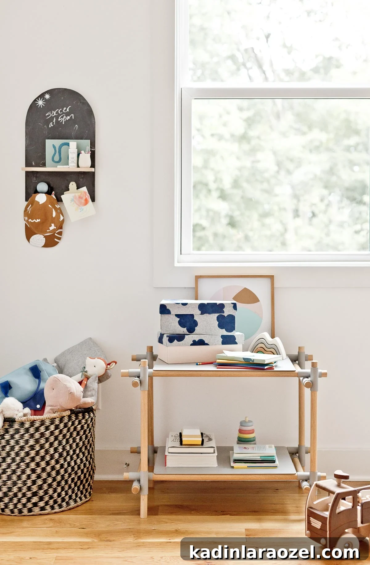 3 Stylish Back-to-School DIY Projects That Impress 13 Neutral modern kid's room with wall organizer, basket of stuffed animals and minimal wood storage shelf