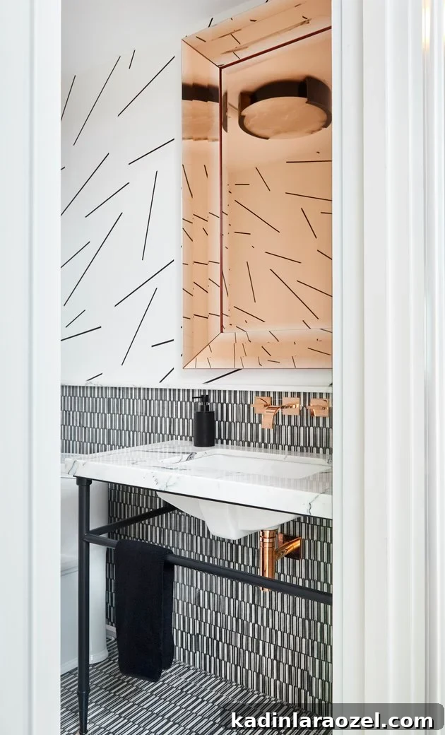 16 Stylish Temporary and Permanent Wallpapers to Transform Your Home 3 A modern, minimal black and white patterned bathroom.