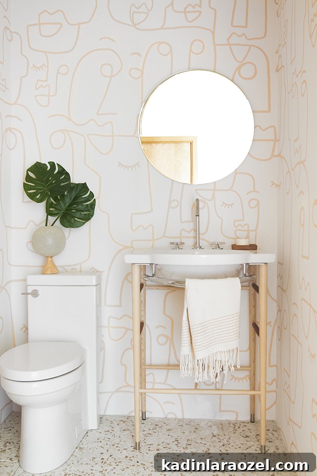 16 Stylish Temporary and Permanent Wallpapers to Transform Your Home 5 Faces wallpaper in bathroom
