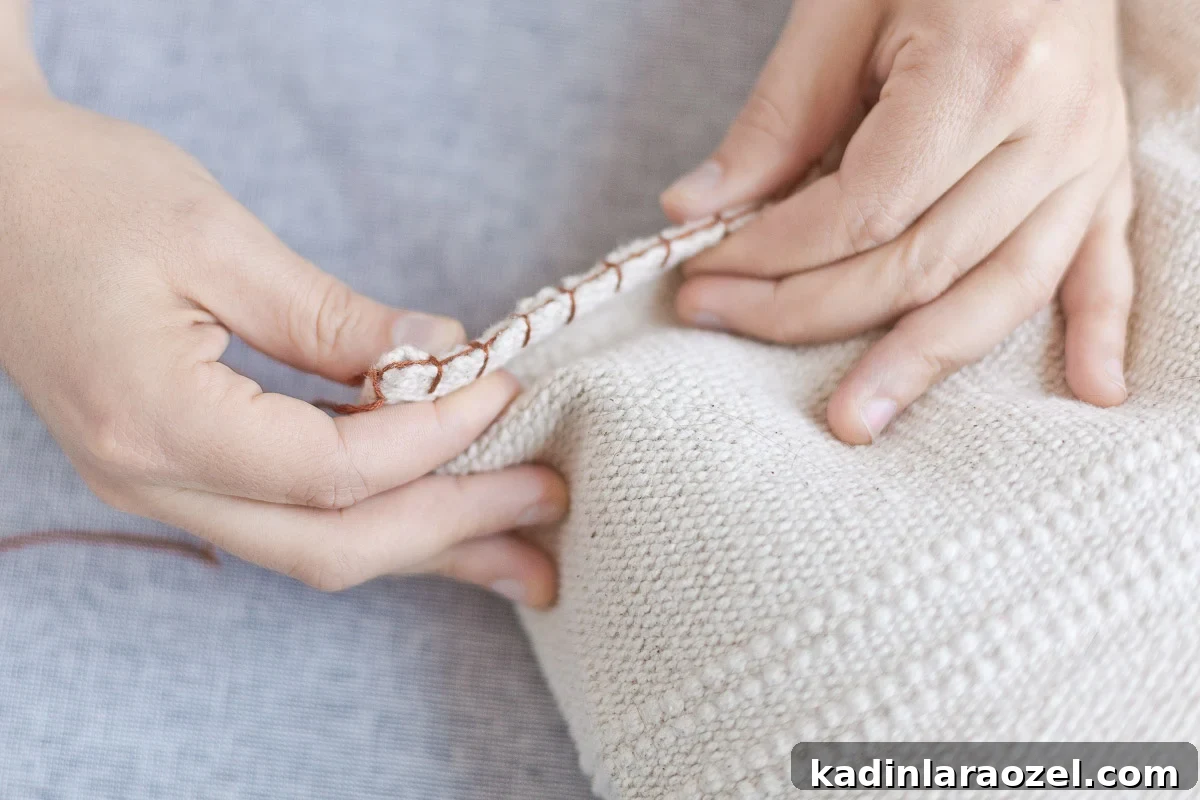 Make a blanket stitch on each side of the rug that will eventually become your cat bed.