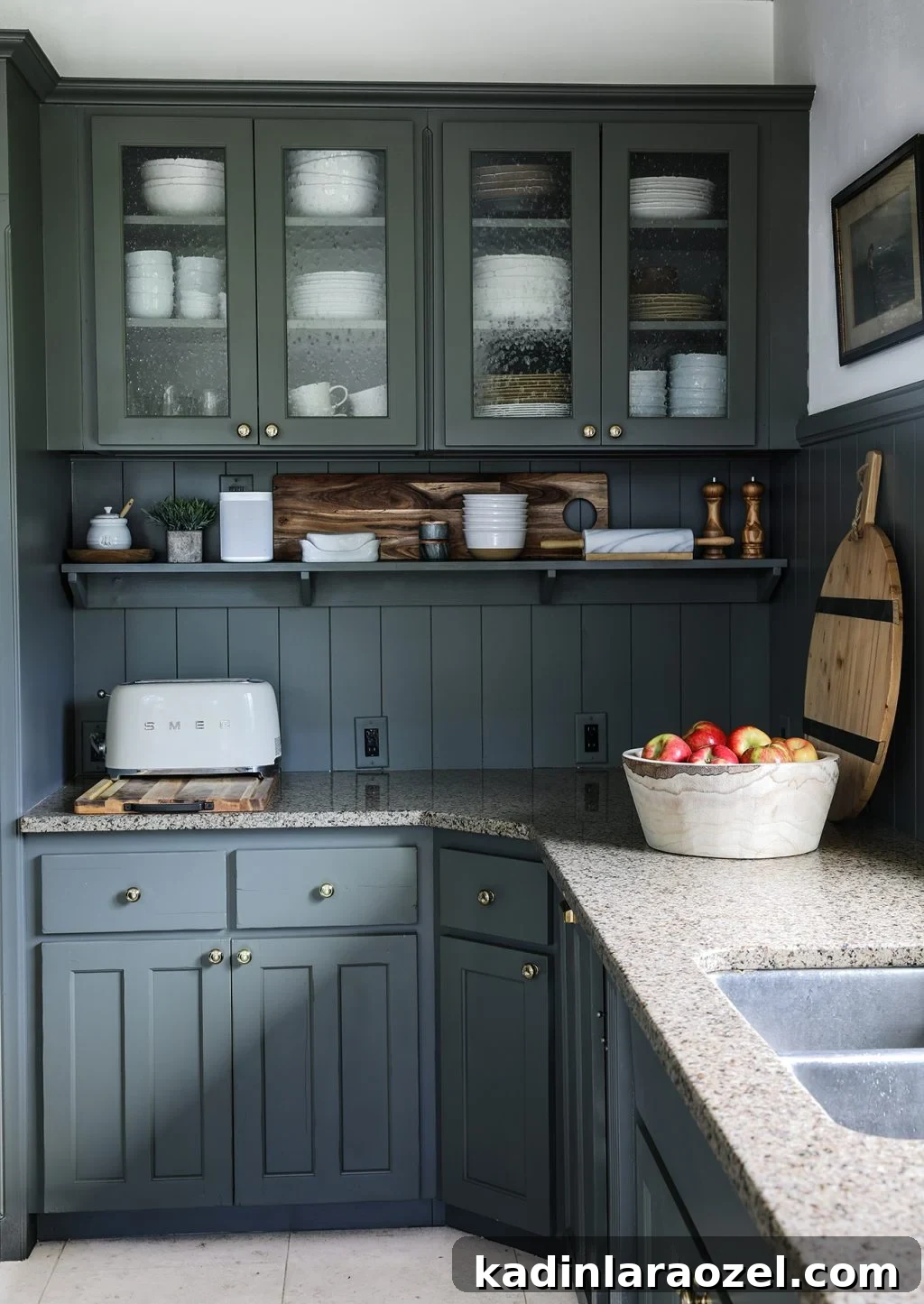 Moody Green Interiors: 12 Stylish Ways to Use the Color 8 Green kitchen cabinets makeover from Chris Loves Julia.