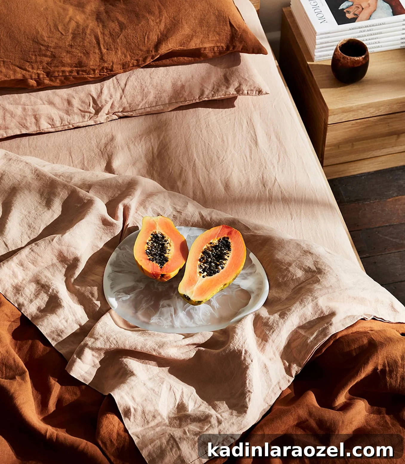 cozy linen bedding in fall colors and a fruit plate in bedroom