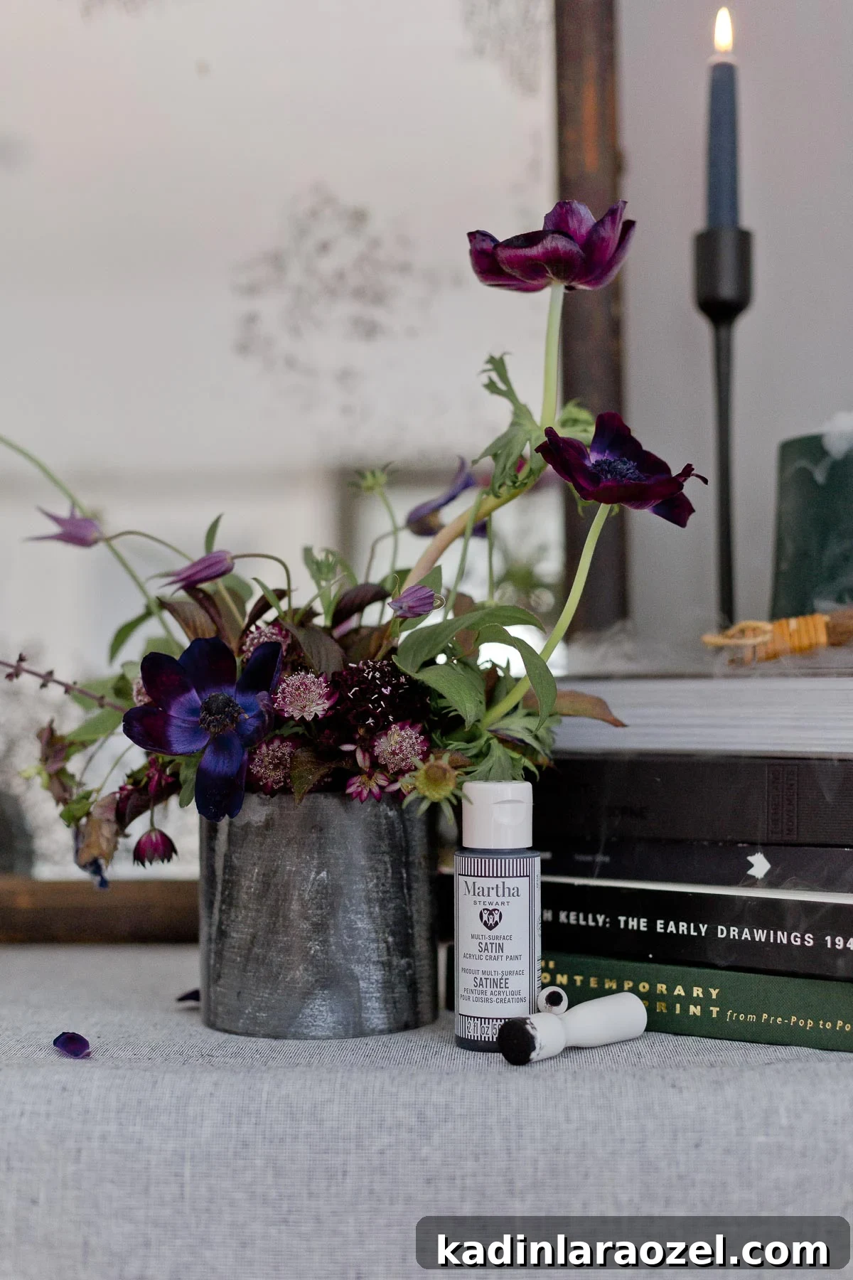 A modern take on Halloween decor with an antique DIY mirror, painted pumpkins, and more.