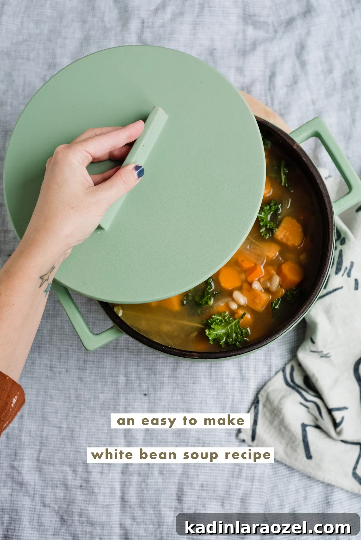 Where Have You Bean All My Life? Creamy White Bean Soup Recipe 2 White bean soup in a green pot with lid.