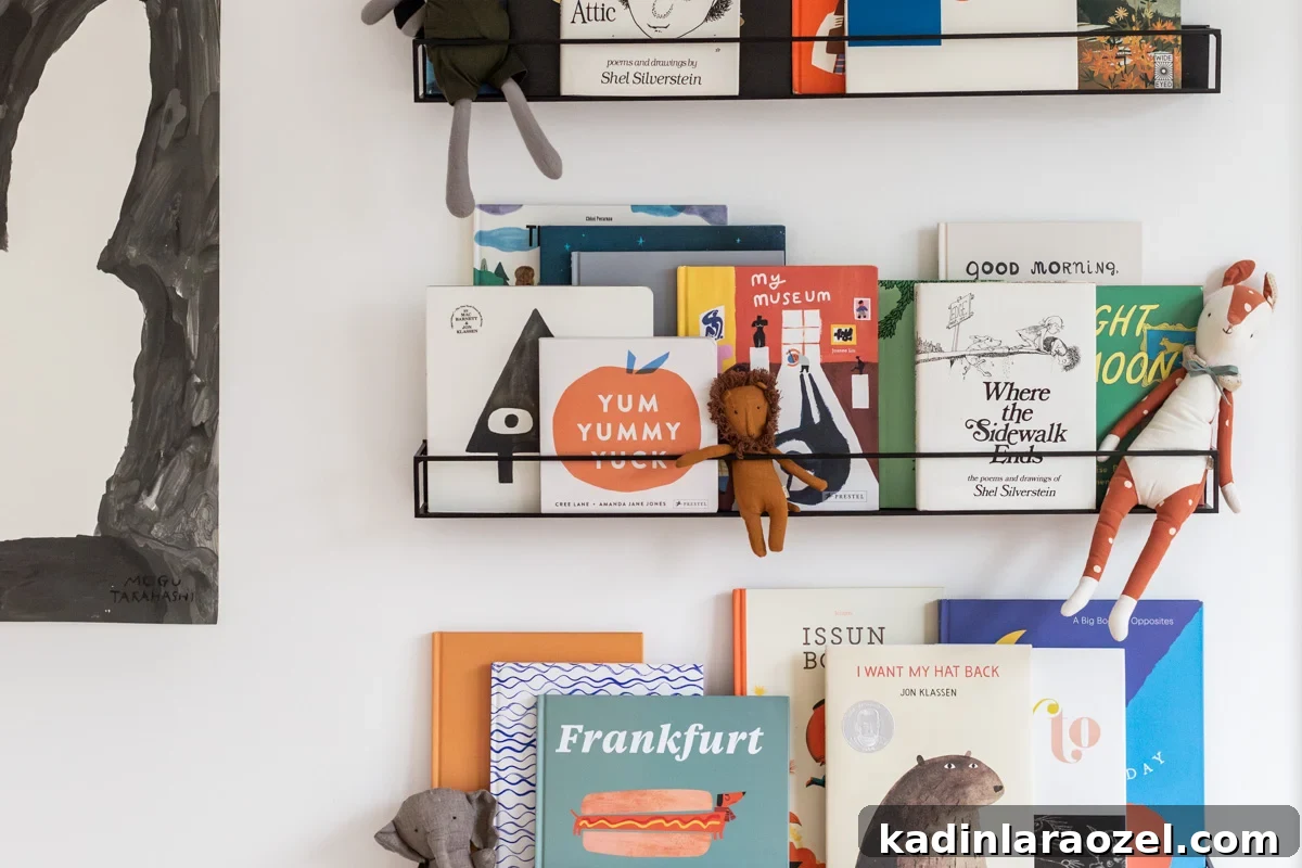 Creative Ways to Style Kids' Bookshelves for a Playful Room 3 metal floating shelves filled with kids books and toys