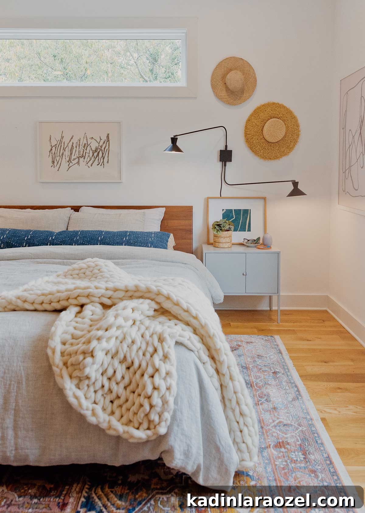 Autumn Makeover: Cozy Updates for Our Master Bedroom 7 A thick, cozy knit blanket hangs off the edge of a platform bed.