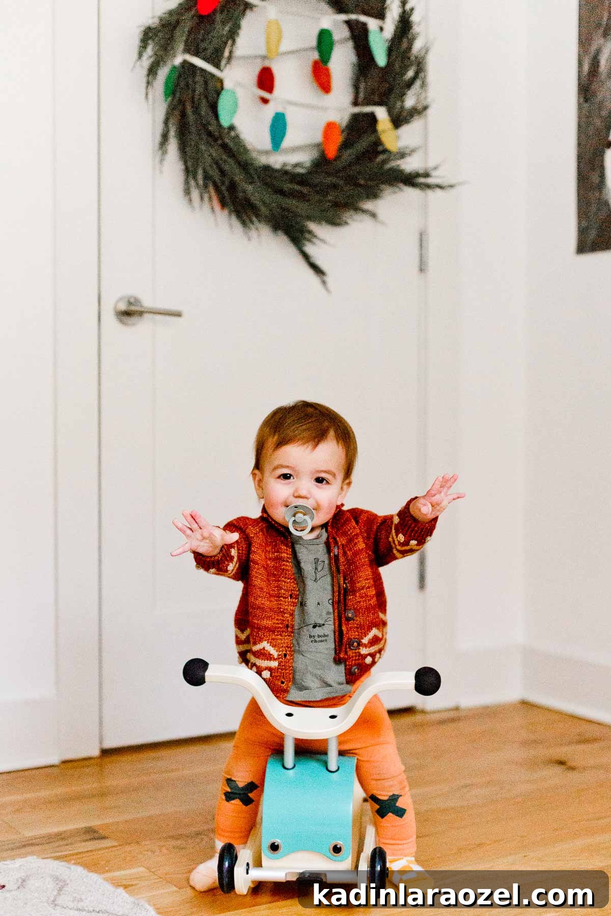 Holiday Nursery Decorating Ideas + Big Baby & Kids Holiday Gift Guide 13 Toddler on big shaped ride on toy - holiday gift ideas.