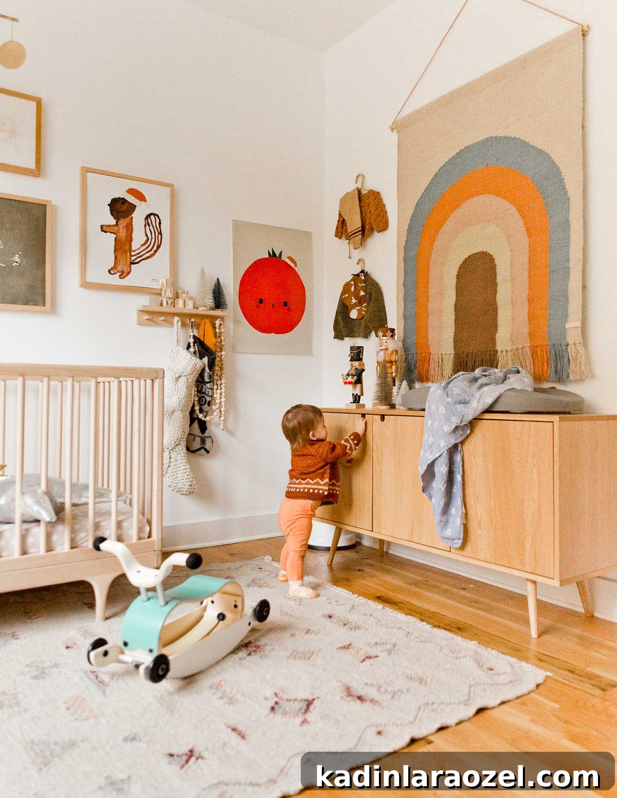 Holiday Nursery Decorating Ideas + Big Baby & Kids Holiday Gift Guide 4 A gender-neutral nursery / kid's room gets an upgrade for the holidays (and beyond). Look at that rainbow wall hanging!