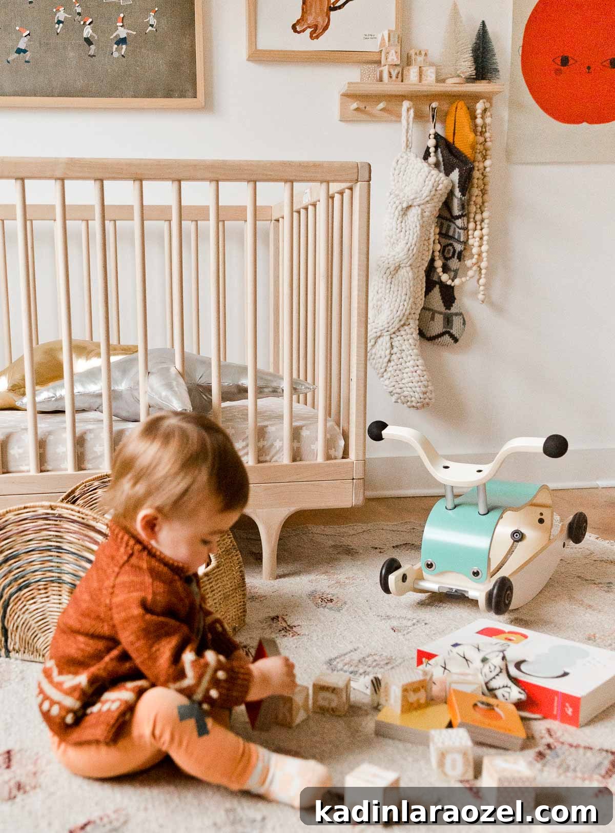 An organic modern nursery with a simple wood crib.