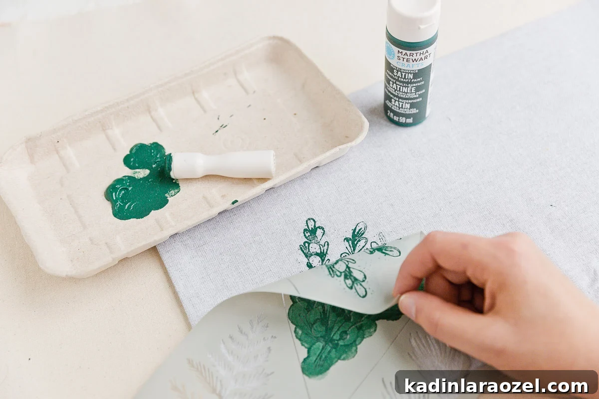 3 DIY Holiday Hostess Gifts That Impress 8 Remove stencil from fabric to reveal completed design