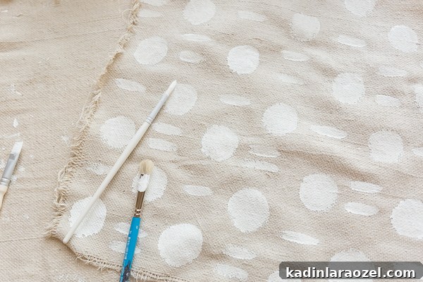 Painting canvas squares and rectangles to create patchwork mud cloth tree skirt