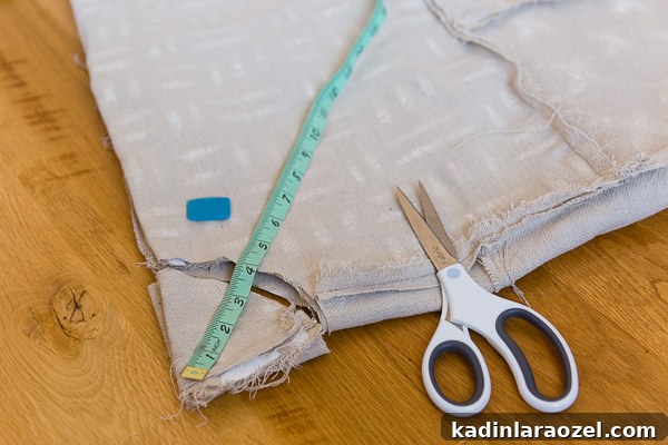 Cutting hole into tree skirt with scissors and measuring tape