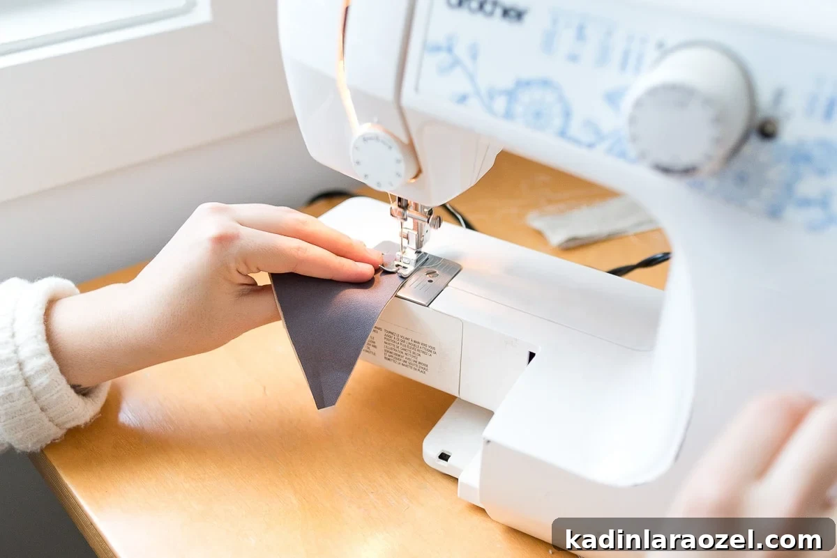 Sewing triangle pieces of fabric together to make quilted stockings for Christmas.