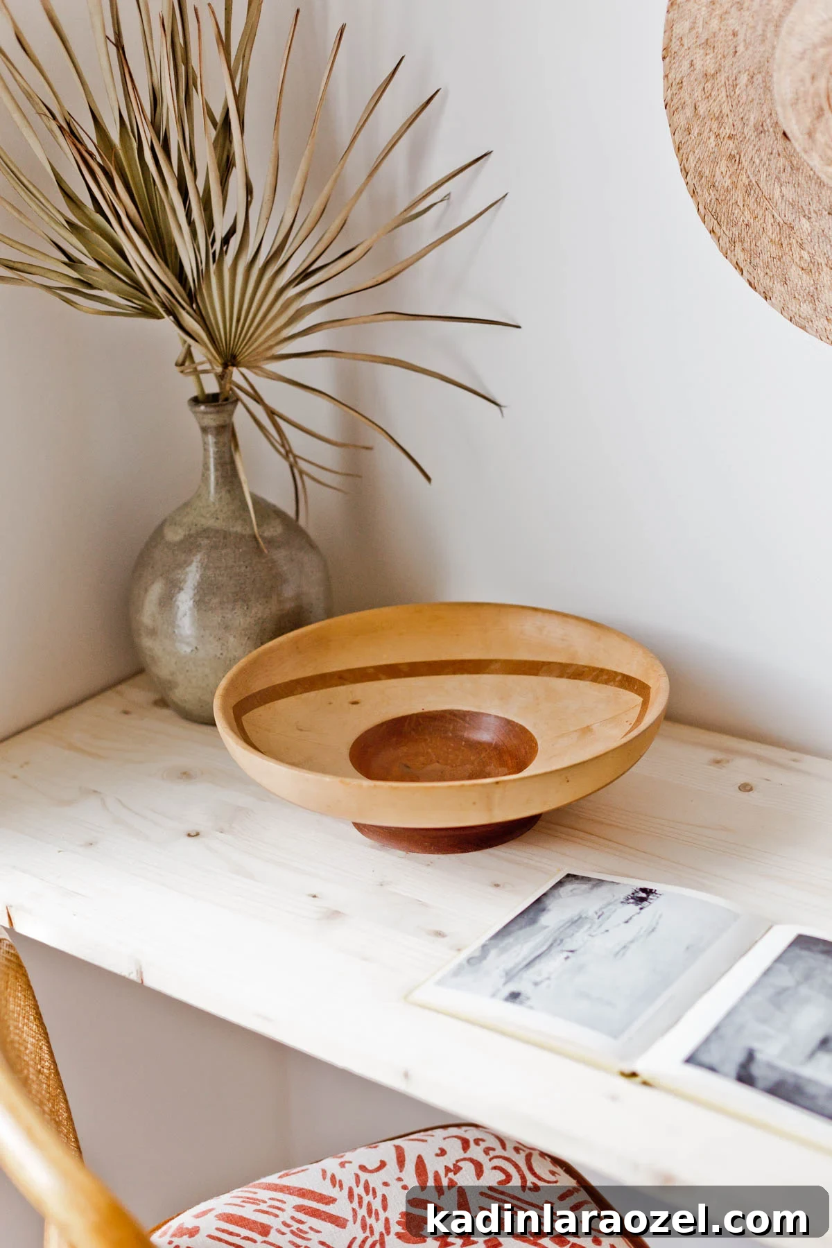 70 Inspiring Journal Prompts to Spark Daily Reflection 3 minimal wood desk with book / journal opened on top