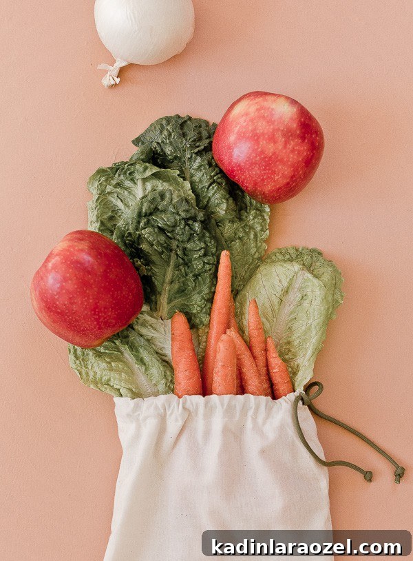 Make Reusable Produce Bags in 15 Minutes: DIY Sewing Guide 13 Fruit and veggies spilling out of cotton produce bag.