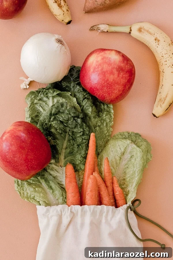 Make Reusable Produce Bags in 15 Minutes: DIY Sewing Guide 14 Reusable produce bag with fruit and veggies spilling out of it.