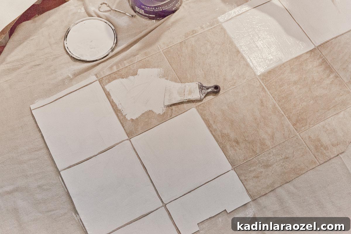 Painting vinyl tile flooring white, with a small paint brush