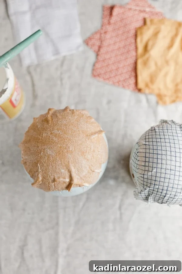 Balloons being used to make paper mâché alternative fabric bowls.