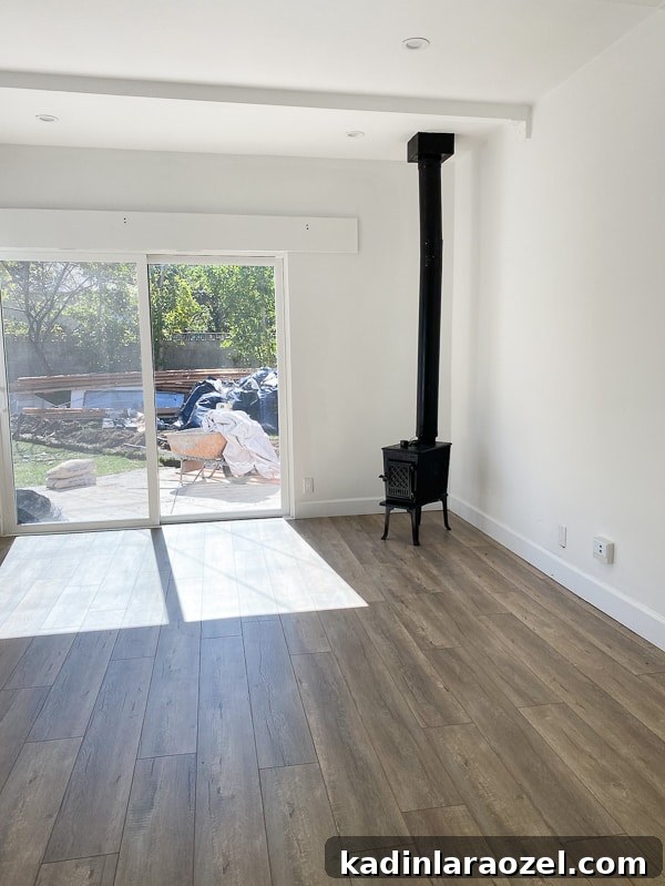 We Moved to California — Before Photos and Home Tour Updates 10 Before photo of empty bedroom with sliding doors that lead outside.