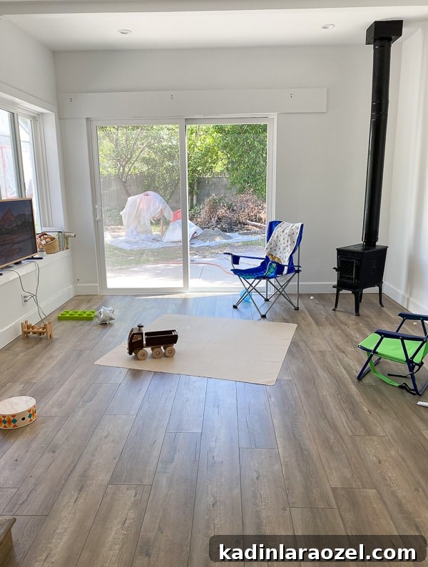 We Moved to California — Before Photos and Home Tour Updates 11 Before photo of bedroom / tv room with sliding doors that lead outside.