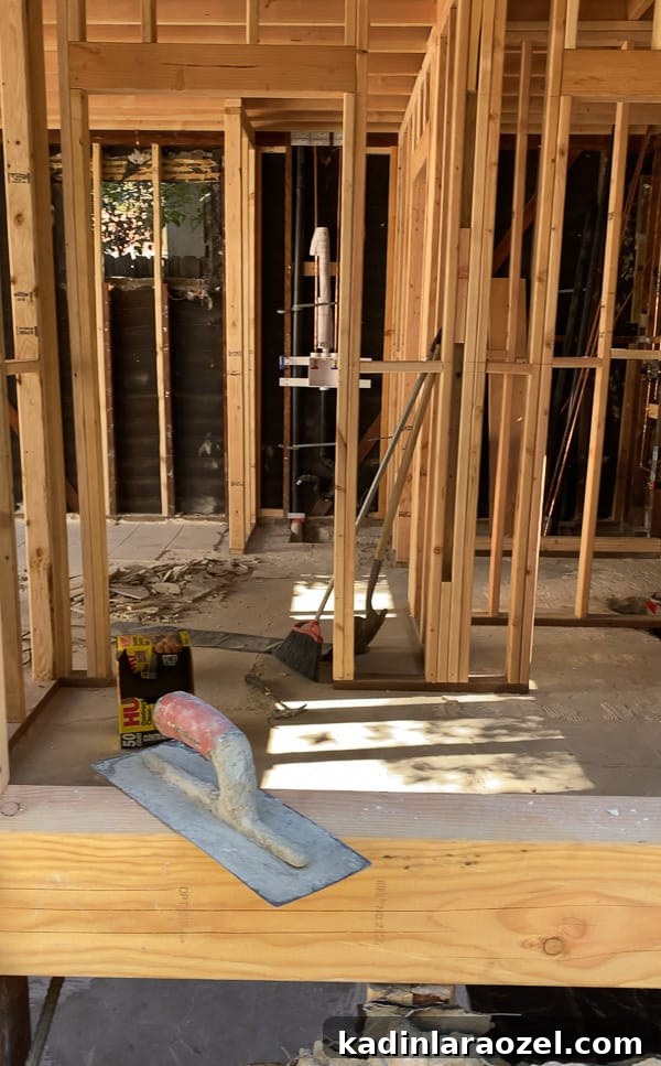 We Moved to California — Before Photos and Home Tour Updates 15 ADU while under construction - showing framing and concrete floor.