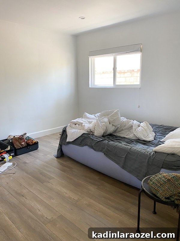 We Moved to California — Before Photos and Home Tour Updates 6 Before photo of basic rental bedroom with blow up mattress.