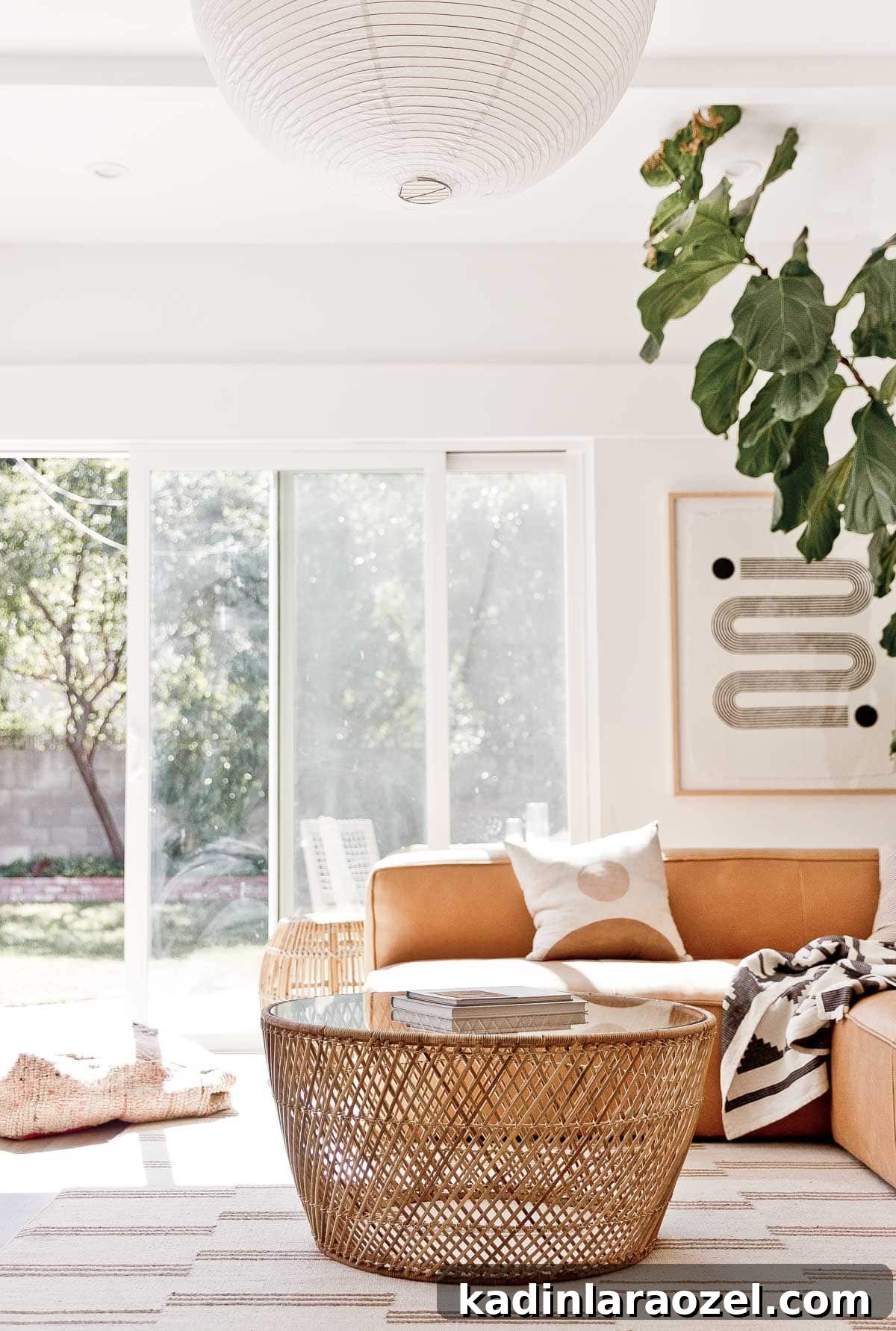 Lounge Room Makeover: In-Depth Furniture Review and Guide 12 Image of wicker coffee table and leather sofa on striped rug with abstract art.