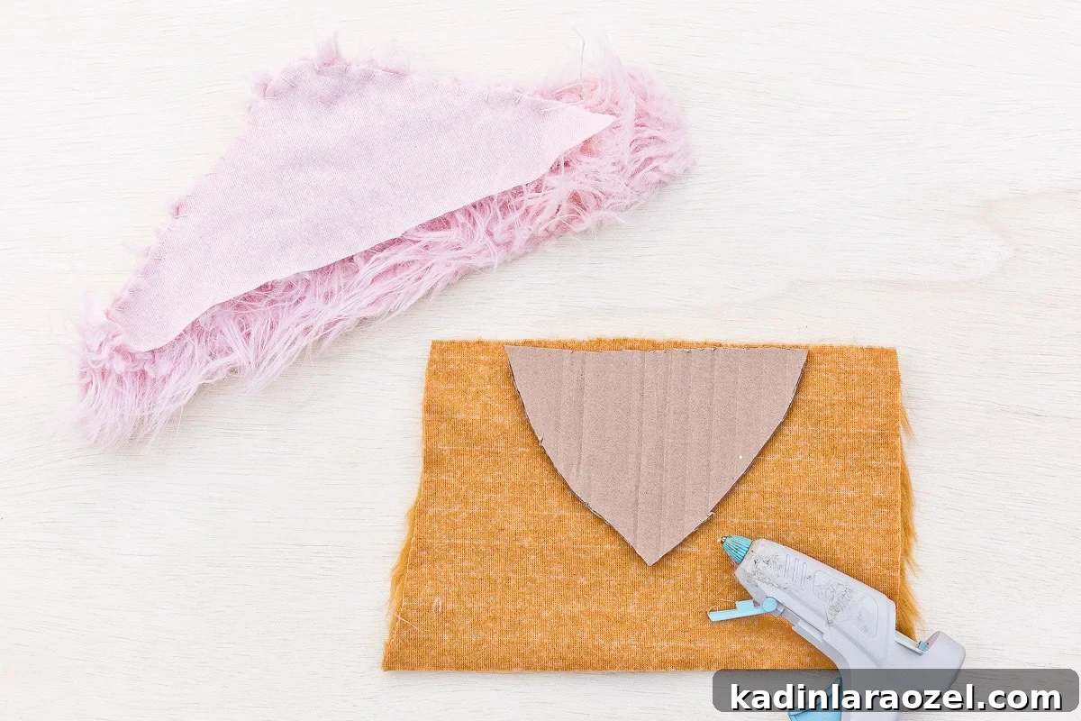 Image of faux fur being made into wings for Halloween bird costume.