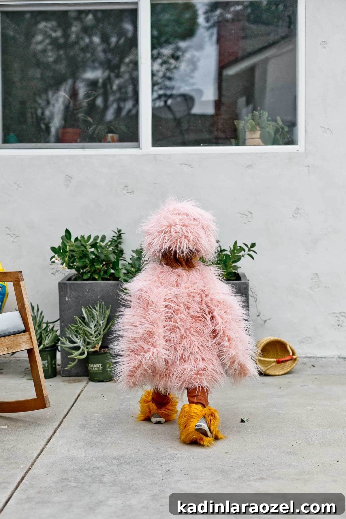 Image of a homemade kids Halloween costume (of a pink bird).