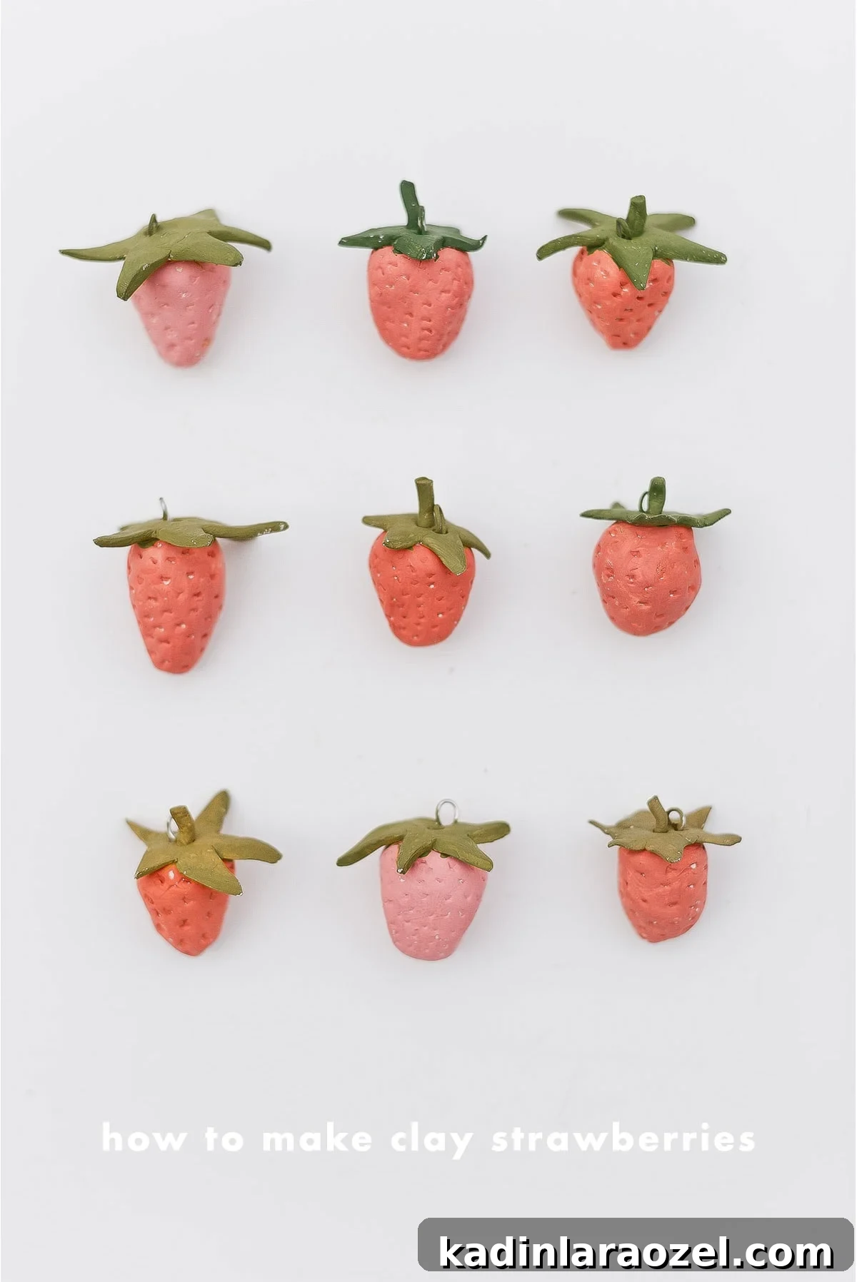 DIY clay strawberries, all lined up.