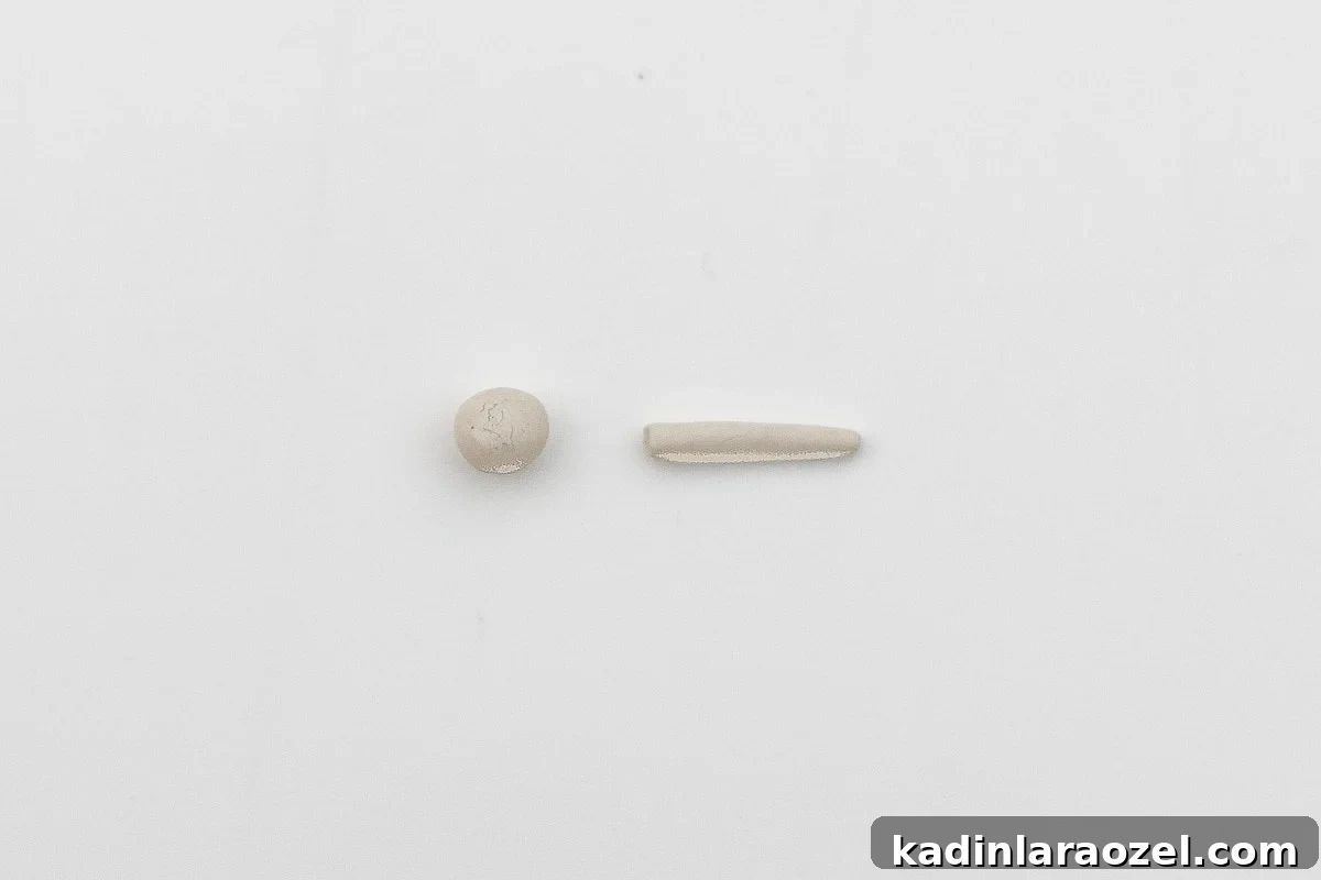 Clay circle that gets rolled into a long stem for a clay strawberry.