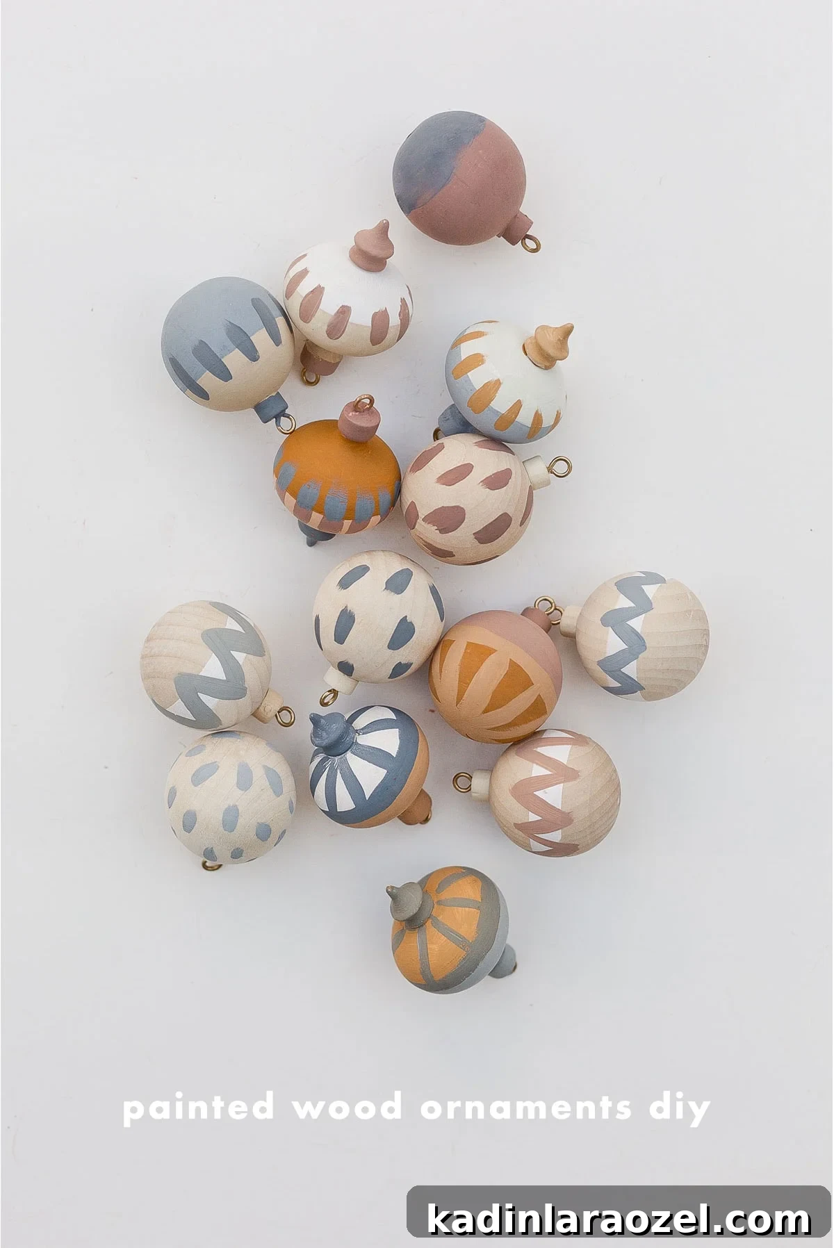 DIY Painted Wood Ornaments and Gift Toppers Tutorial 5 Hand painted wood ornaments in various globe shapes.