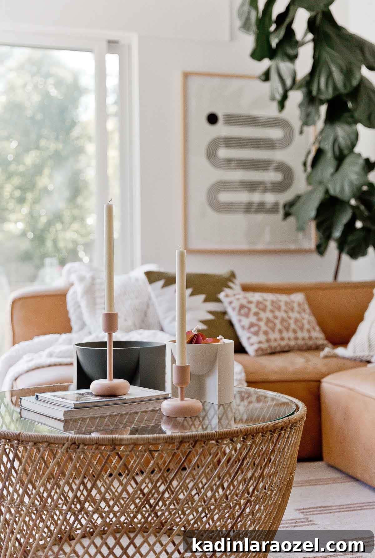 Peach candlesticks and modern bowls on a bohemian coffee table.