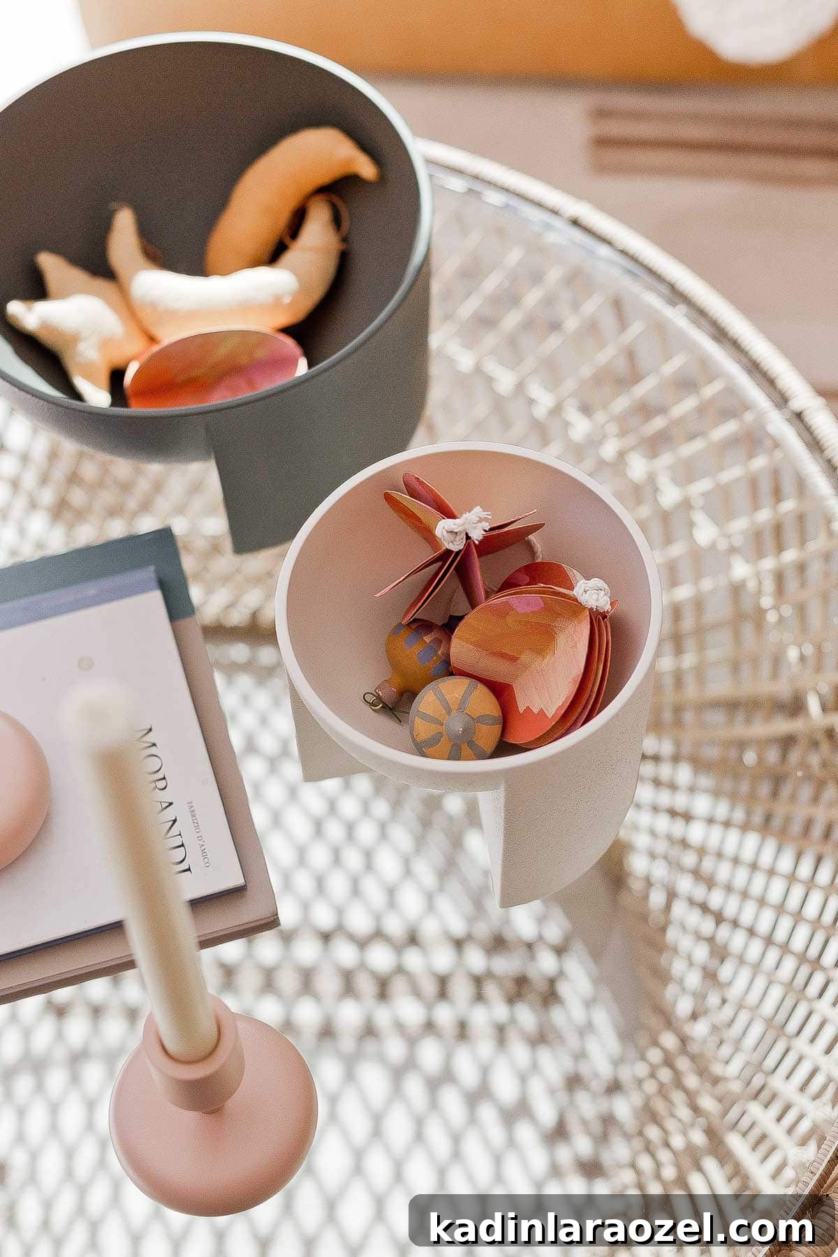 Overhead shot of small modern bowls on a glass coffee table.