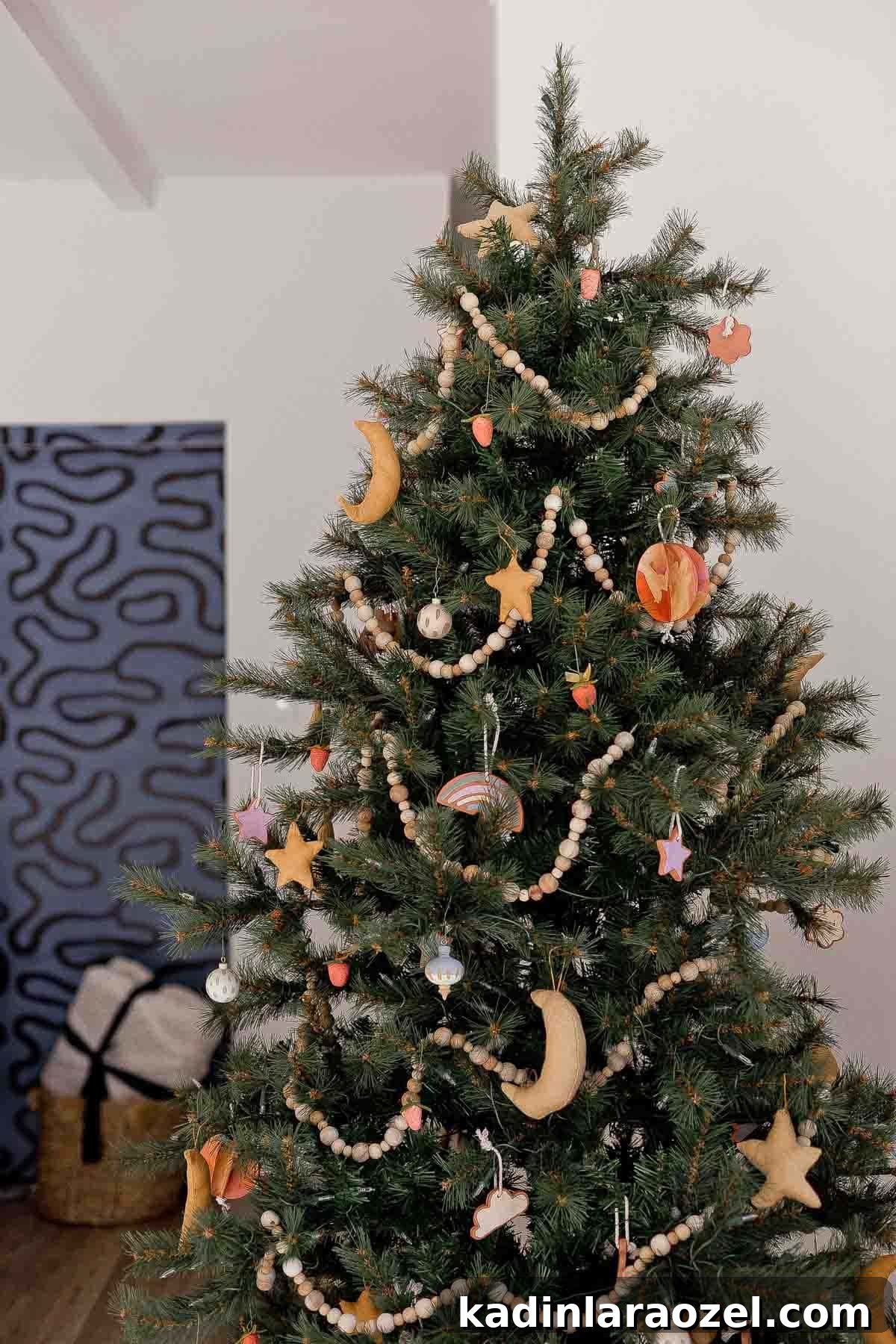 Image of whimsical Christmas tree with very kid-friendly ornaments.
