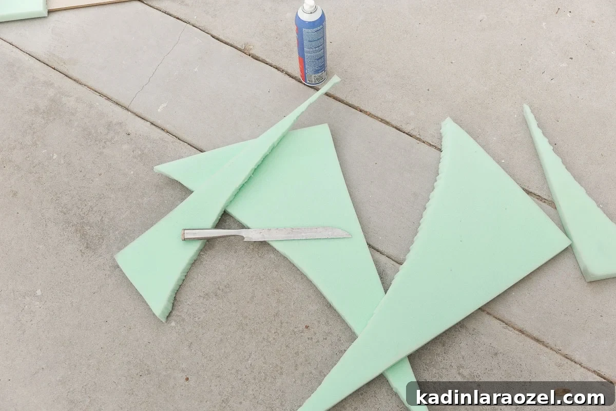 Statement-Making DIY King Size Half-Circle Headboard 10 Cutting upholstery foam to make a DIY statement headboard.